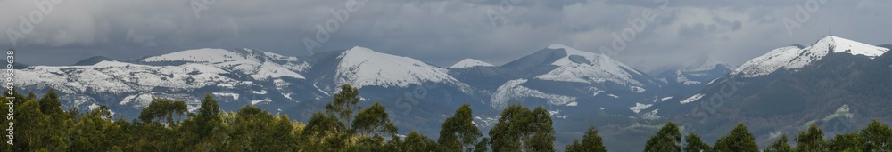 Panoramic view of the snowy Triano mountains from Monte Alen in Sopuerta