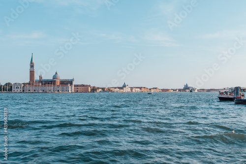 Venice lagoon on a sunny day, Italy. Travel Background, Europe. Old italian architecture in Venezia. High quality photo