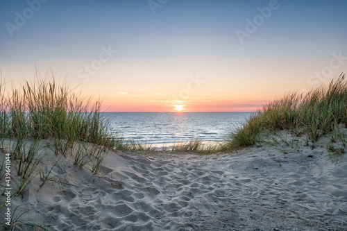 Fototapeta Naklejka Na Ścianę i Meble -  Sand dunes on the beach at sunset
