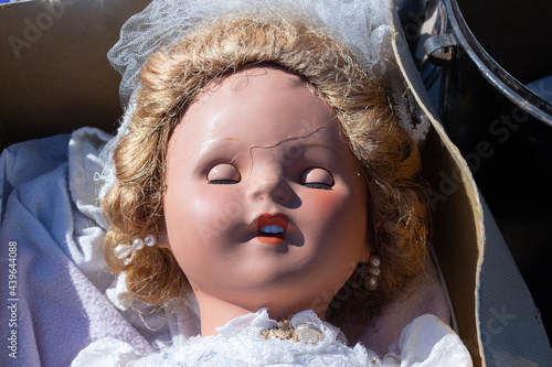 Tableau sur toile Old dolls at a second-hand car boot fair in York, UK.