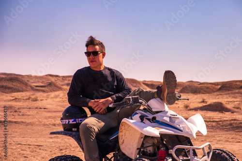 man riding an ATV