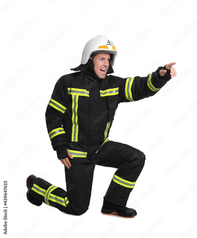 Full length portrait of firefighter in uniform and helmet on white background Full length portrait of firefighter in uniform and helmet on white background