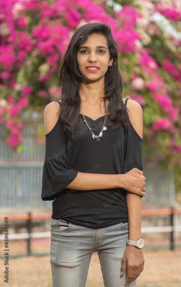 Beautiful young girl posing in a park, Portrait Beautiful young girl posing in a park, Portrait