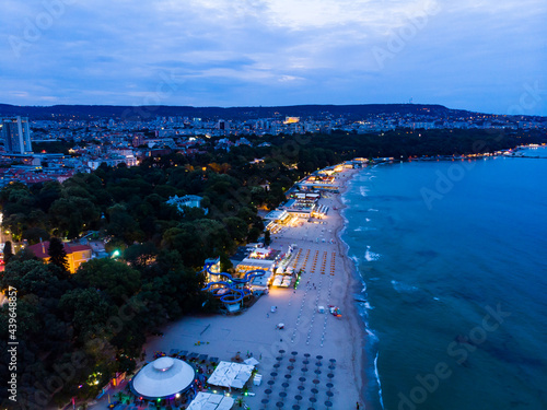 View from above of the hotels in night Varna in Bulgaria. Summer holiday in Europe. Aerial photography, drone view. photo
