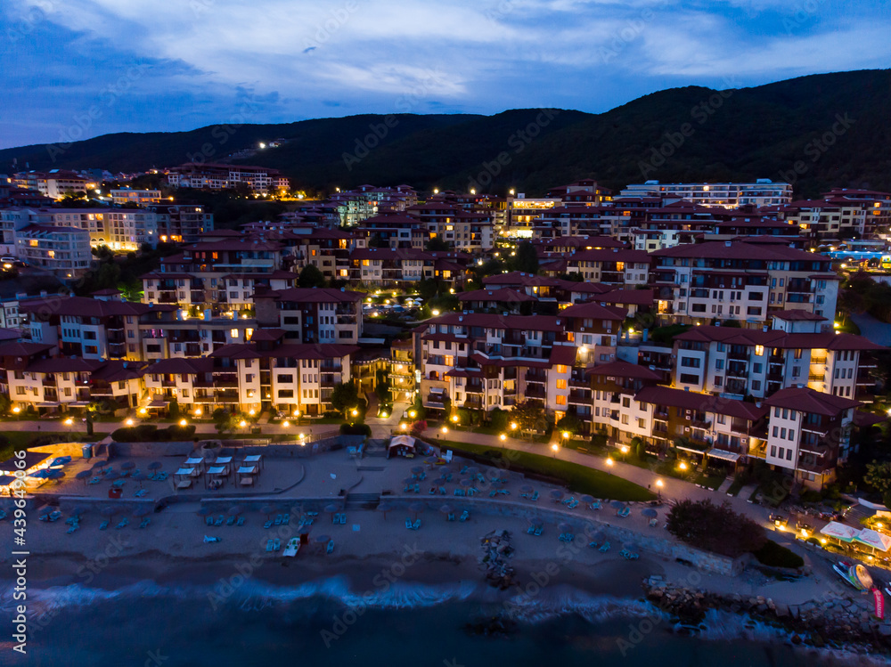 Panoramic view of the hotels of night Sveti Vlas in Bulgaria. Summer holiday in Europe. Aerial evening photography, drone view.
