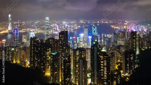 Wallpaper Mural Hong Kong city skyline at night with Victoria Harbor and skyscrapers. Torontodigital.ca