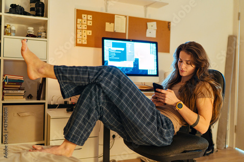 woman distracted from work at home office