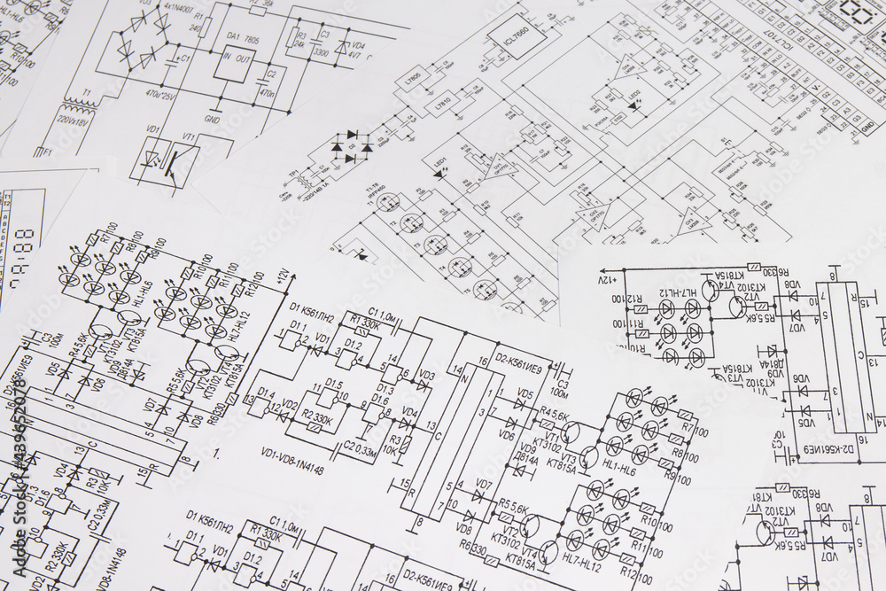 Paper electrical engineering drawings. Work of an electronic engineer. Paper electrical engineering drawings. Work of an electronic engineer.