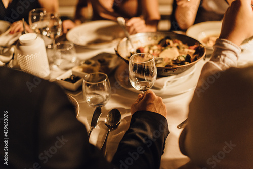 Group of people having dinner photo