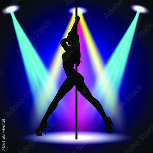 Beautiful silhouette of young women dancing a striptease. Sexy pole dancing