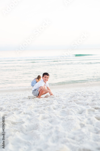 Young Brother and Sister Playing on Beach  © KCULP