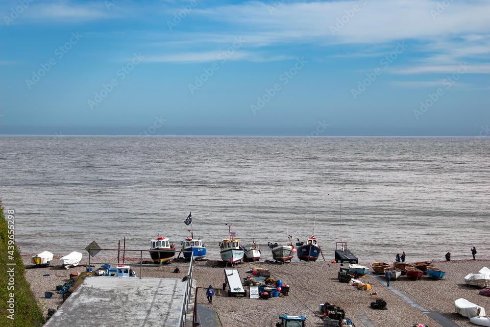Fototapeta premium Maritime scenery - boats lined neatly on the shore