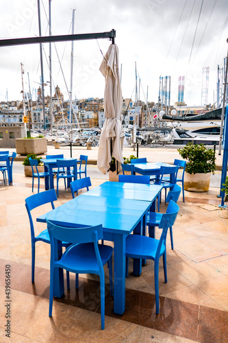 tables and blue chairs