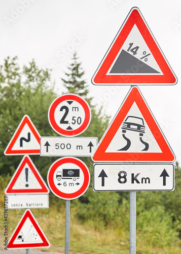 Road Sign Multiples from downhill mountain pass