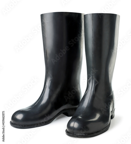 Black rubber boots on a white background. Isolated