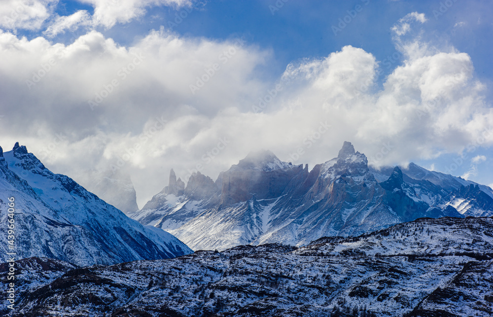 Fototapeta premium Winter in Patagonia: snow covered mountains in Torres del Paine National Park, Chile