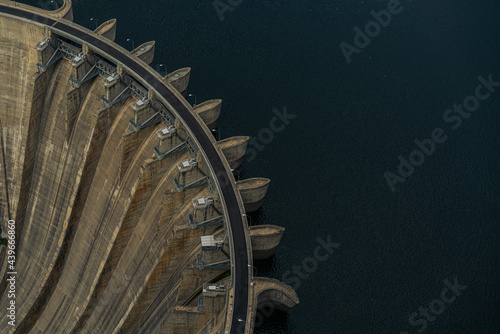 Aerial top view of an artificial dam and reservoir water photo