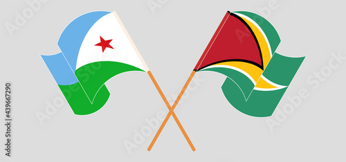 Crossed and waving flags of Djibouti and Guyana