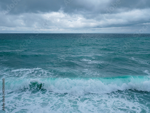 view of ocean waves and a fantastic rocky shore