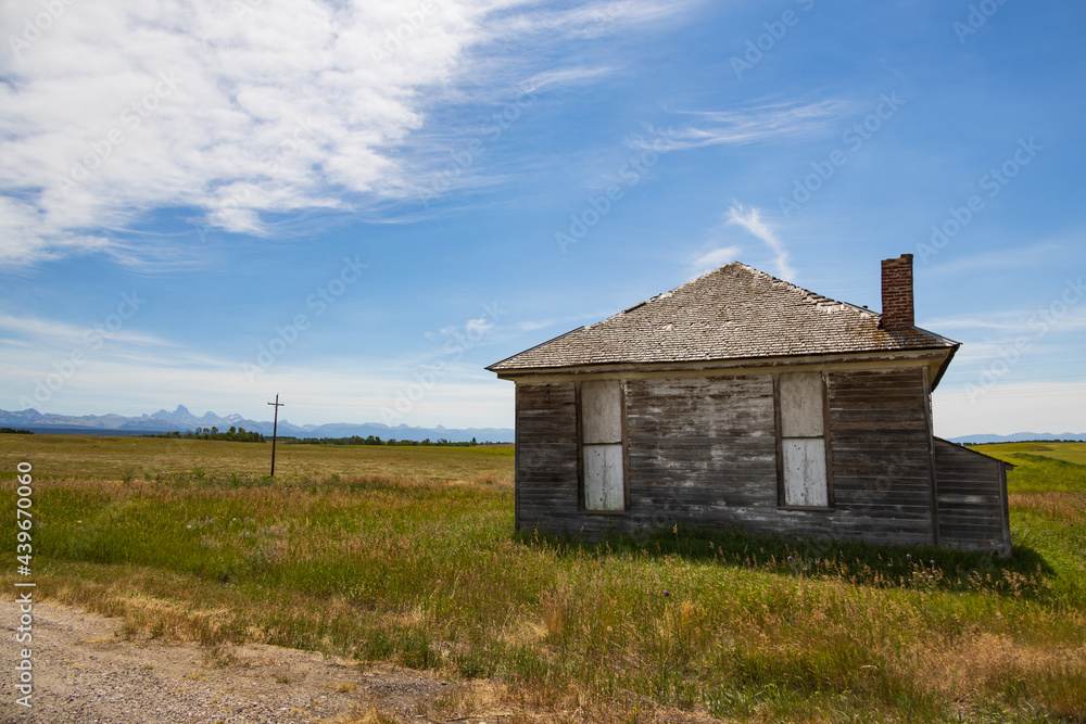Old boarded up abandoned house in Wyoming, USA