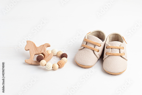 Gender neutral baby shoes and accessories. Organic newborn fashion photo