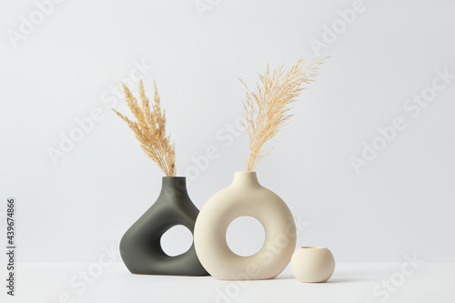 Twigs in ceramic vases photo