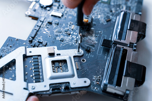 Technology maintenance hardware from man engineer. Repair computers. Electronic technician pc service.