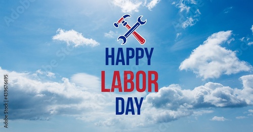 Happy labor day text and tools against clouds in blue sky