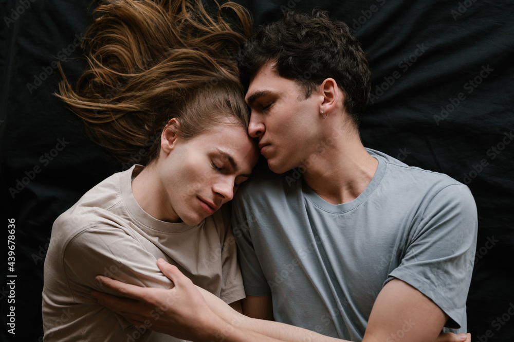 Boyfriends resting on bed with closed eyes Boyfriends resting on bed with closed eyes