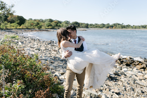 bride and groom at the beach photo