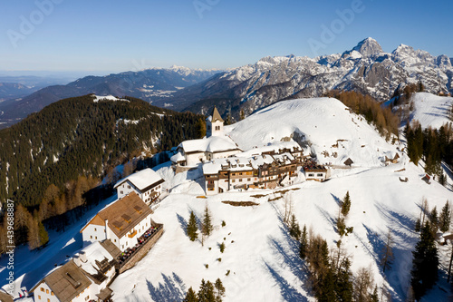 Aerial view of a village on mountains photo