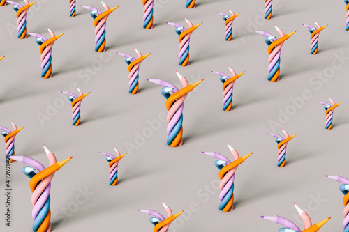 Twisted colorful pencils on grey background photo