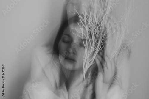 beautiful woman portrait with motion blur, female face black and white