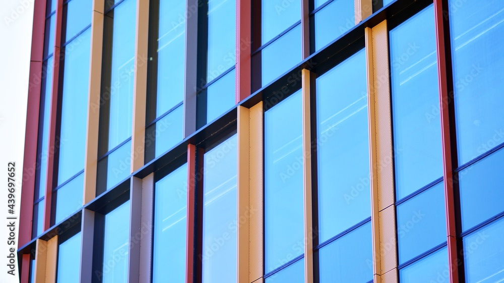 custom made wallpaper toronto digitalGlass facade of the buildings with a blue sky. Modern building in the business city center. Background of modern glass buildings. 