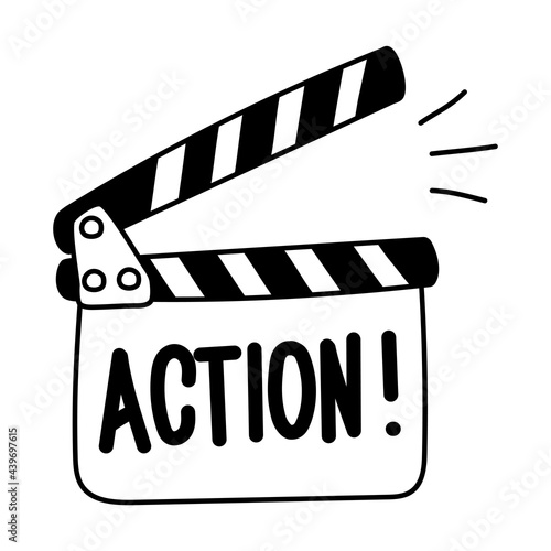 Movie clapperboard icon. Hand drawn sketch film clapper for cinema production in artistic doodle style. Front closeup view with word. Action. Movie clapper for filmmaking. Art movie clapboard.