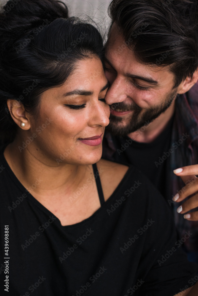 Close up of cute couple having a romantic moment of closeness Close up of cute couple having a romantic moment of closeness