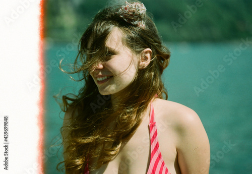 A beautiful woman smiling on a beach