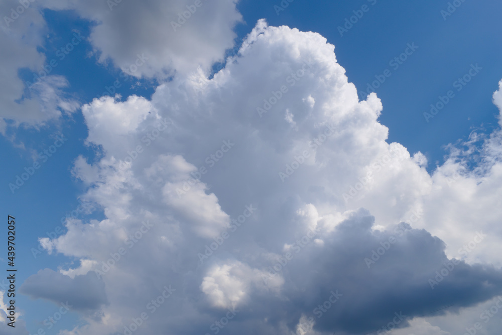 Fluffy white clouds on a blue sky Fluffy white clouds on a blue sky