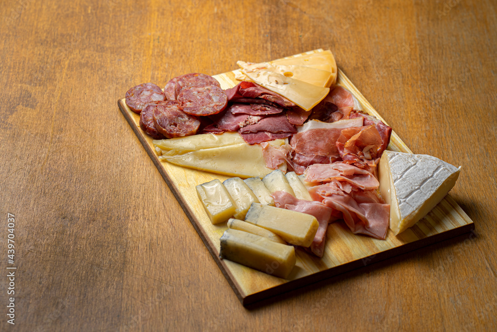 table with cold cuts and cheeses