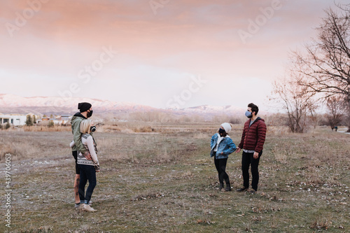 Friends Social Distancing in Park