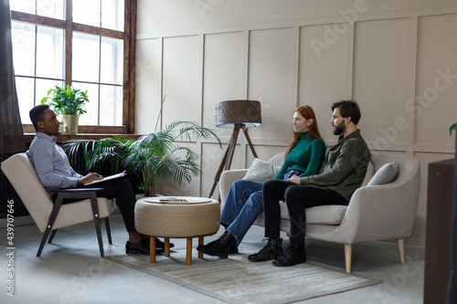 Psychologist having first meet with couple  photo