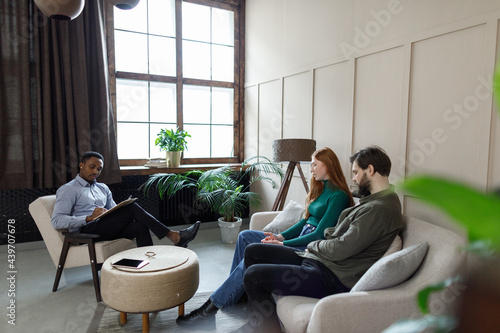 Family having meet with psychotherapist  photo