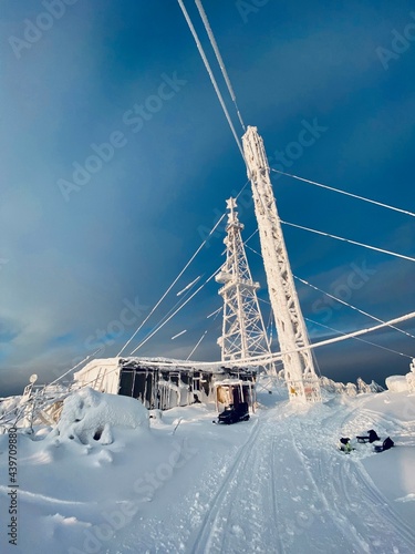 infrastructure with cables on a snowy mountain