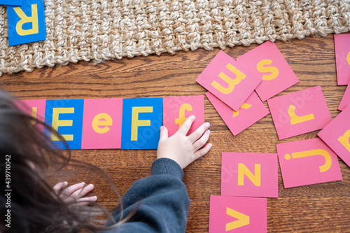 Child learning the alphabet photo