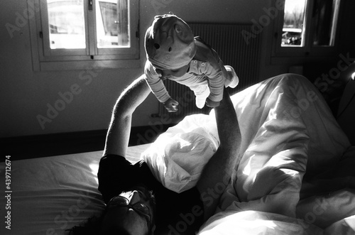 A beautiful family in a bedroom