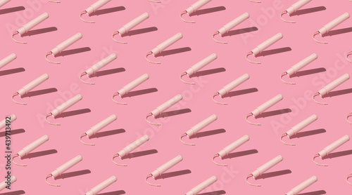 pattern of menstrual tampons in pink tones photo