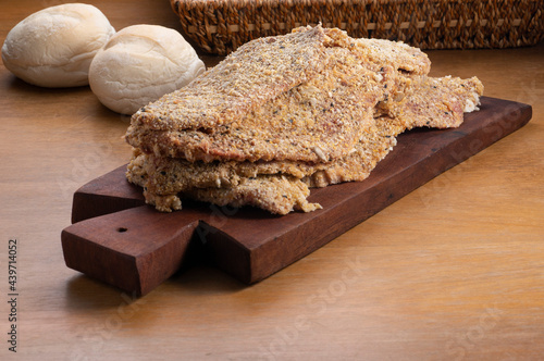 Canvas Print raw milaneses on wooden board