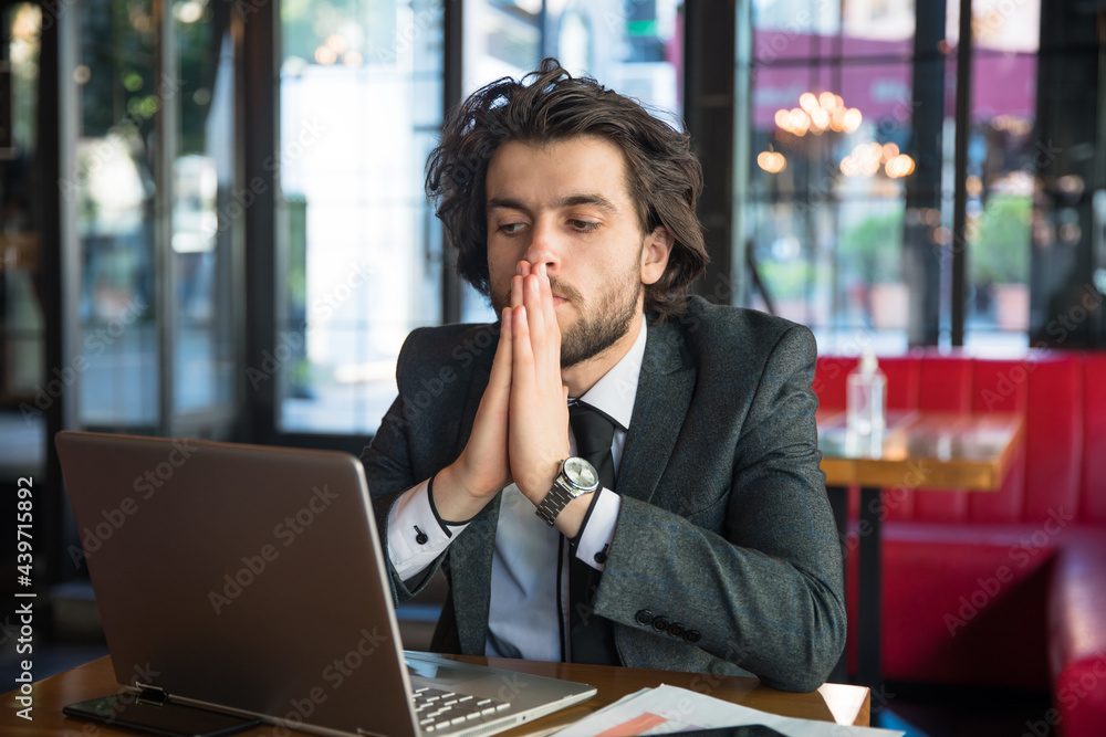sad man working in computer sad man working in computer