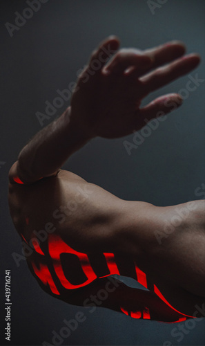 Man with an abstract inscription

