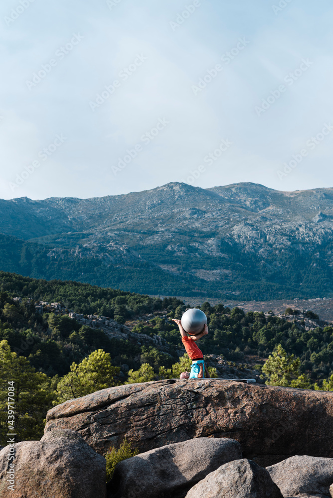 Adult male practicing yoga in nature Adult male practicing yoga in nature